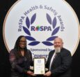 Ivan Tibble receives the RoSPA award from RoSPA's Kizzy Augustin