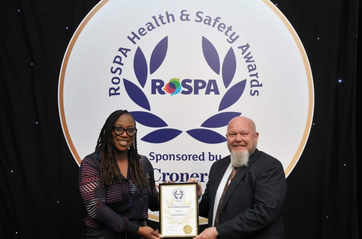 Ivan Tibble receives the RoSPA award from RoSPA's Kizzy Augustin