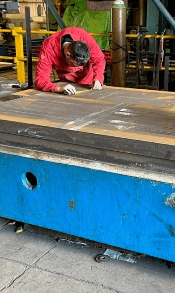 Lower cylinder bracket fabrication